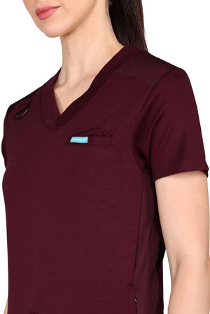 Maroon jogger scrub set with convenient, easy-access pockets