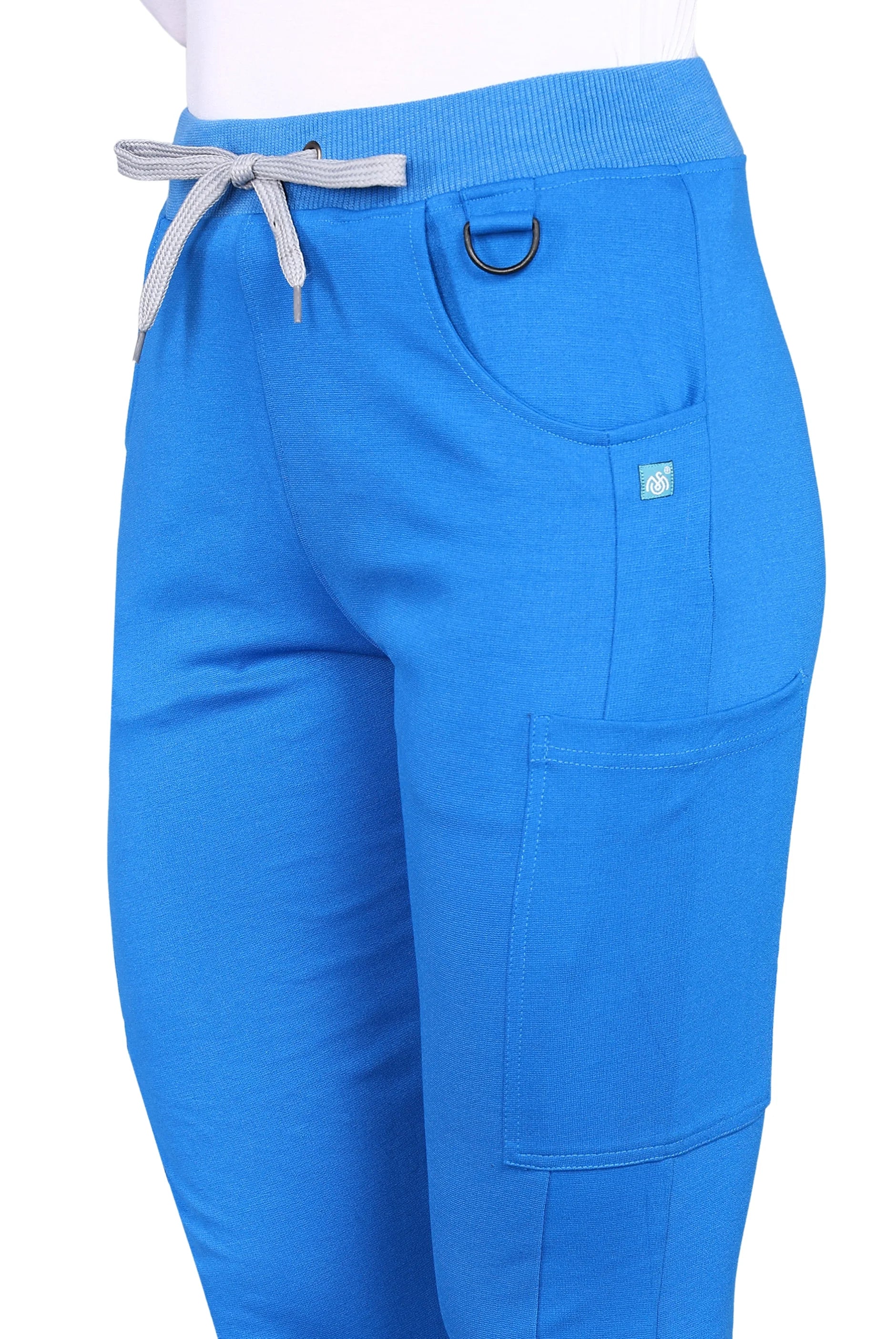 Easy-access royal blue jogger scrub set with functional pockets.